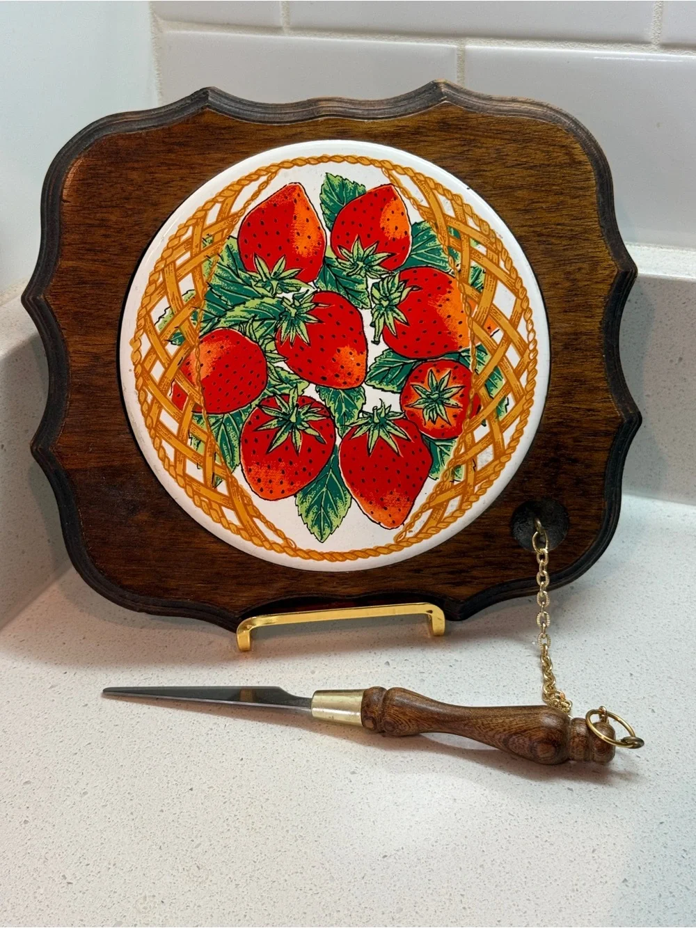 Vintage cheese board with matching knife.